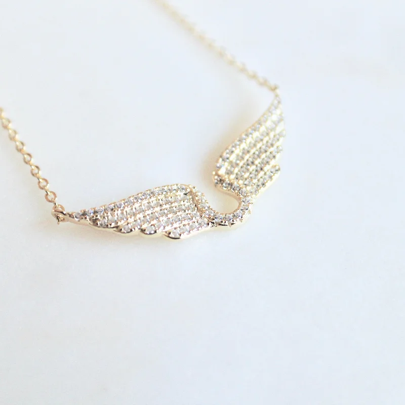 white gold diamond cluster ring Angel wings necklace