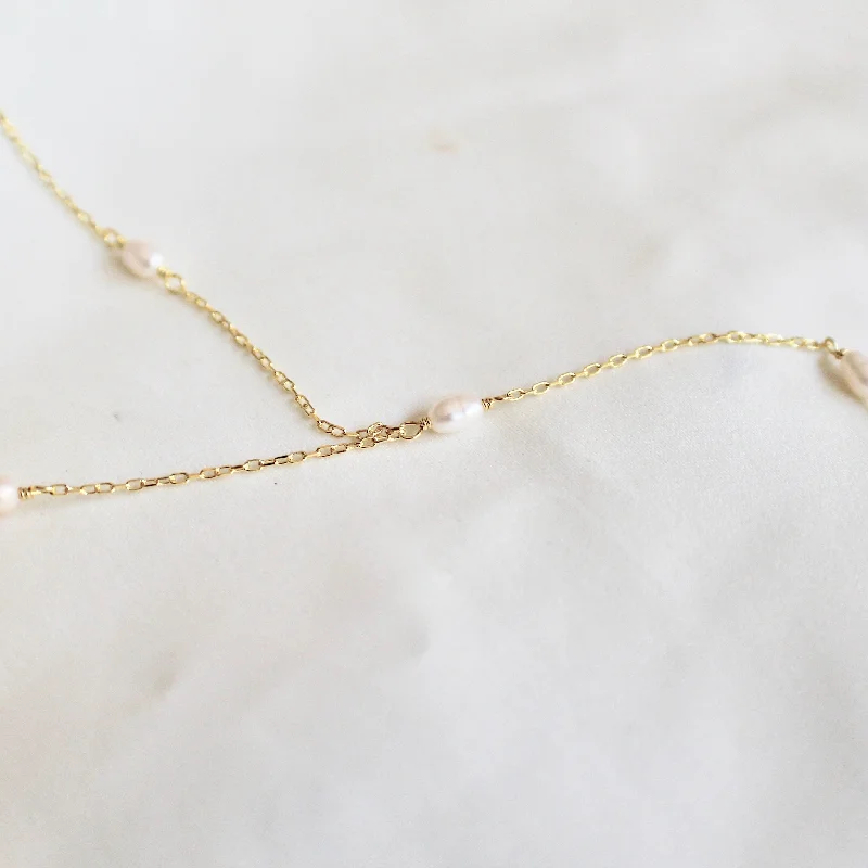 black onyx men’s signet ring Pearl lariat necklace